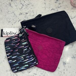3 -Kipling Black, Pink, and Multicolor Cosmetic Bag Trio